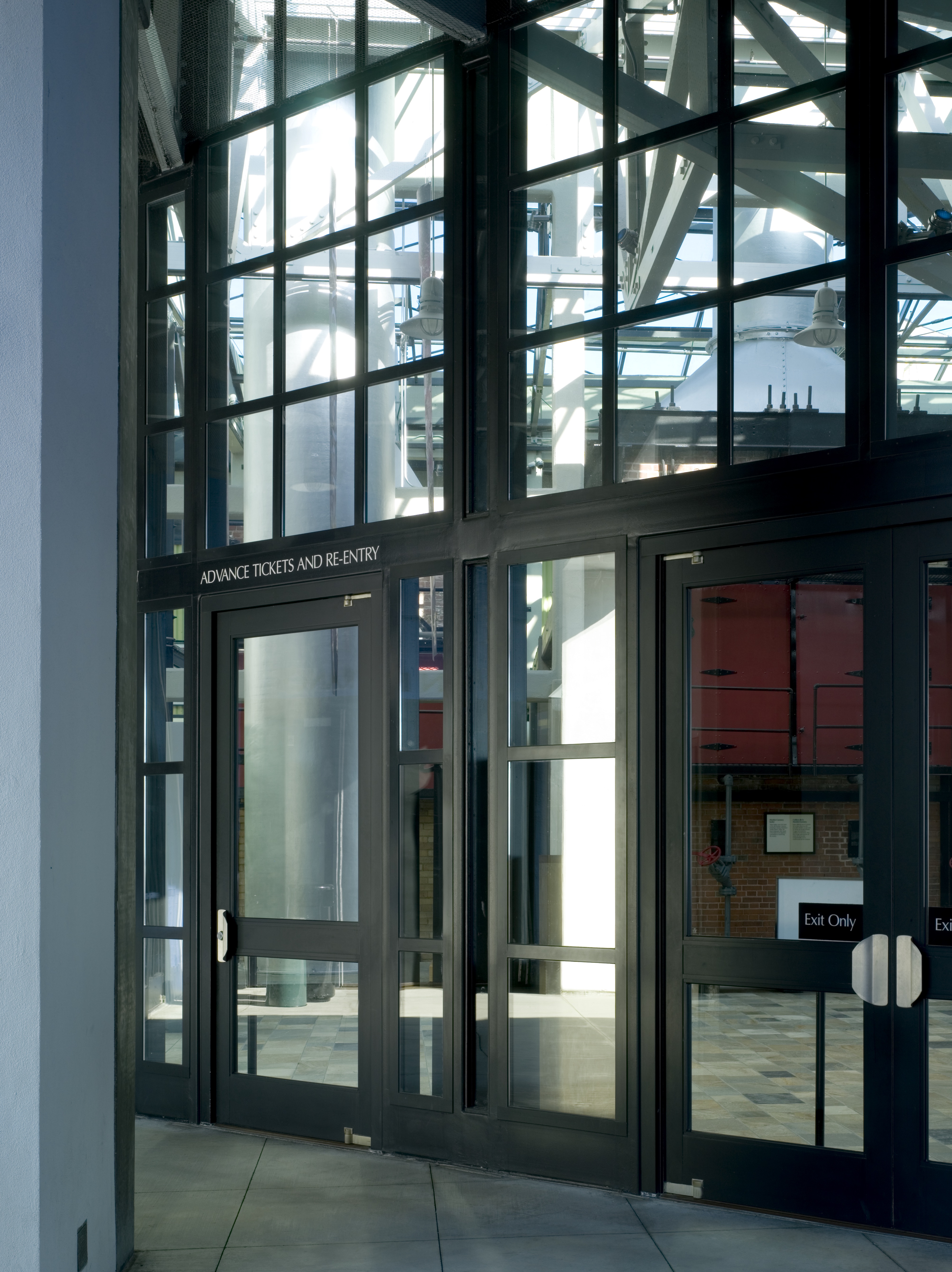 Press Ellison Bronze Custom Balanced Doors Deliver Durability to